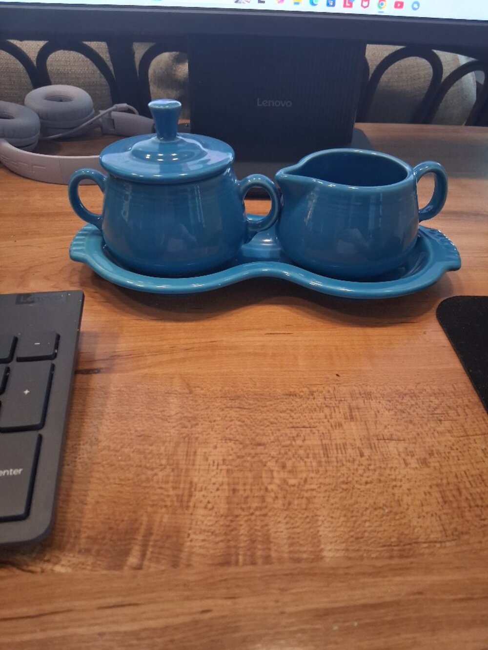 Fiestaware turquoise blue creamer and lidded sugar bowl on trayar